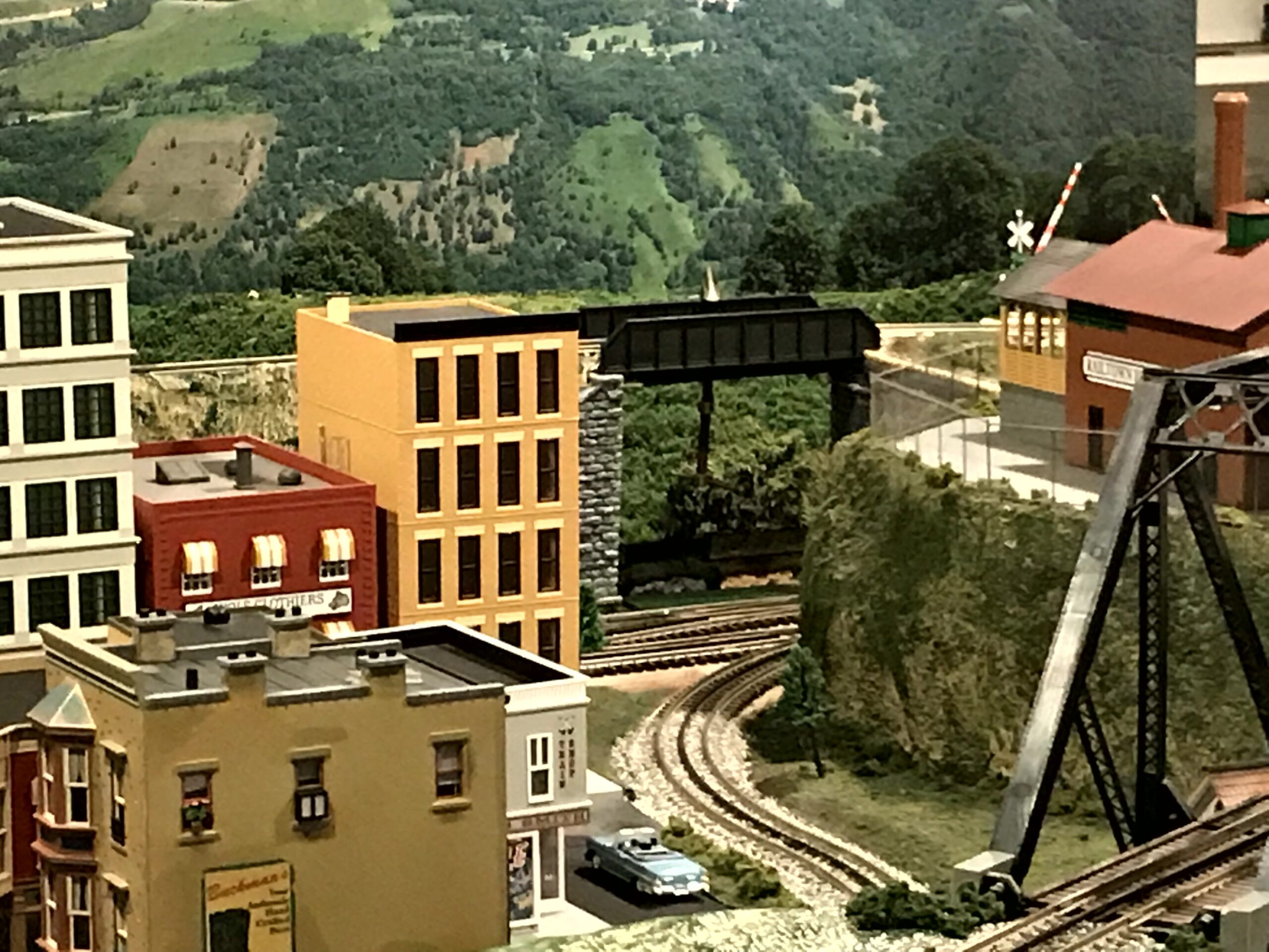 Layout photo with the Long Island RS3 Diesel about to cross a small girder bridge, marked S&SCRR (Sweetbriar and Southern Cape Railroad)